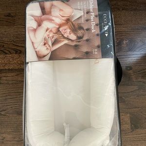 Brand new Dock A Tot deluxe